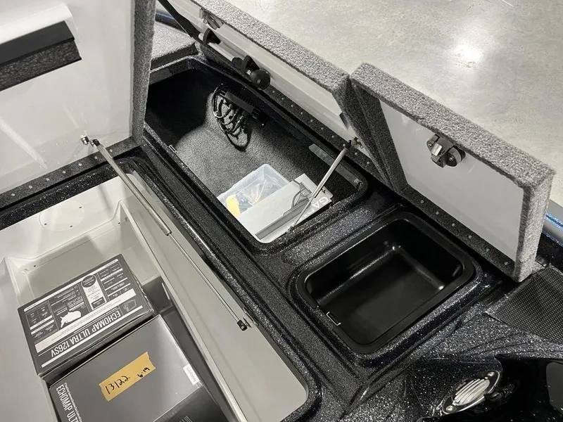 Slide: The Image of 2024 Phoenix 920 Elite boat storage compartments and accessories. - 15