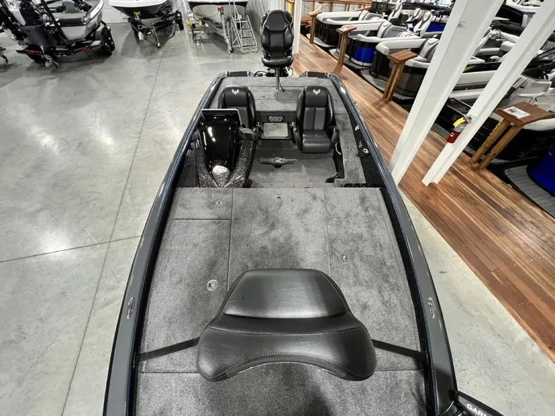 Slide: The Image of 2024 Phoenix 920 Elite fishing boat interior in showroom. - 29