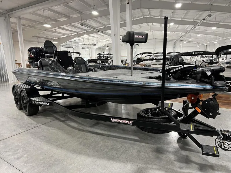 Slide: The Image of 2024 Phoenix 920 Elite fishing boat in showroom. - 3