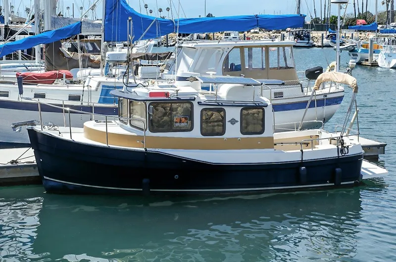 The Image of 2014 Ranger Tugs R-25 SC docked at a marina. - 1