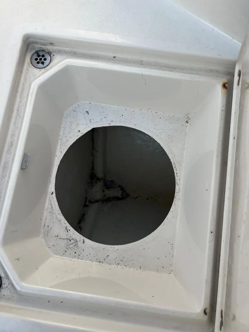 Slide: The Image of Storage compartment of a 2020 Stingray 216 CC boat. - 14