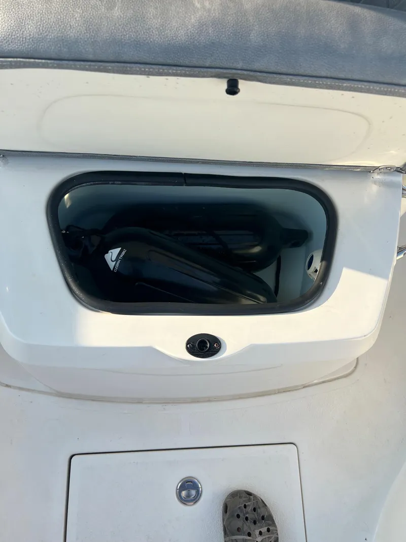 Slide: The Image of Storage compartment of a 2020 Stingray 216 CC boat. - 17