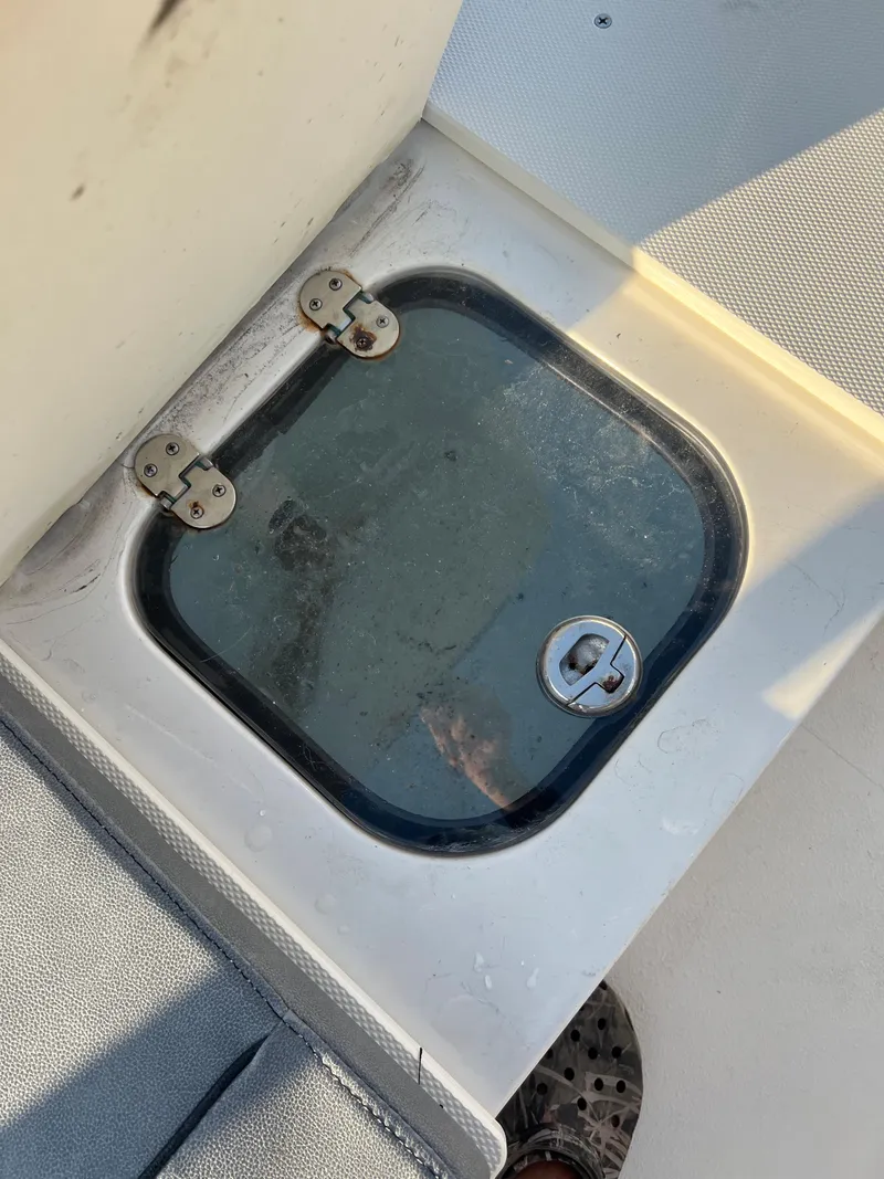 Slide: The Image of Hatch on a 2020 Stingray 216 CC boat. - 19