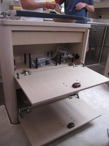 Slide: The Image of Interior of 2024 Jeanneau 55 yacht showing open storage compartments. - 38