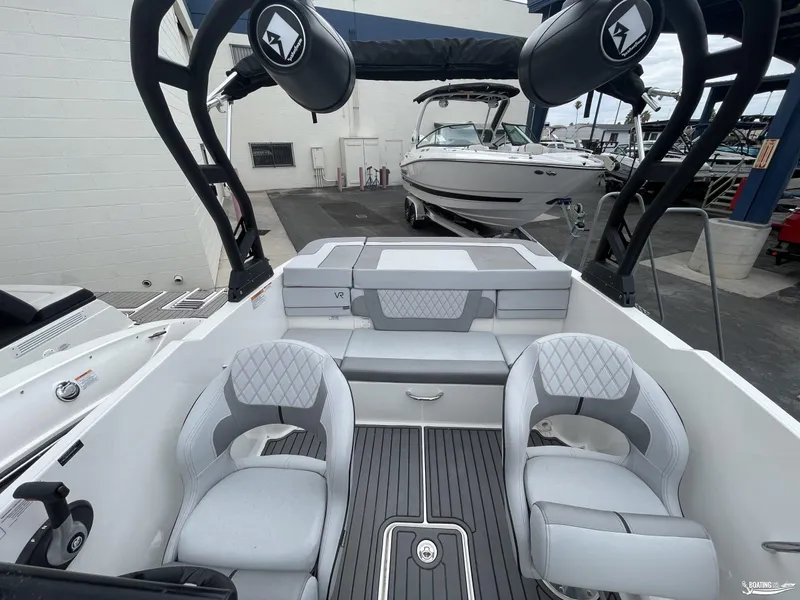 Slide: The Image of 2023 Bayliner VR4 boat interior with stylish seating and modern design. - 5