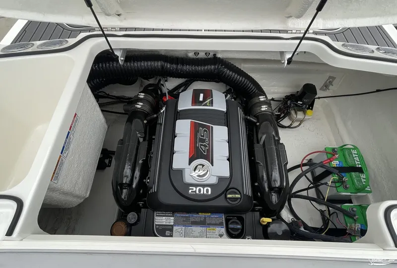 Slide: The Image of 2023 Bayliner VR4 engine compartment with 4.5L 200 HP MerCruiser engine. - 8