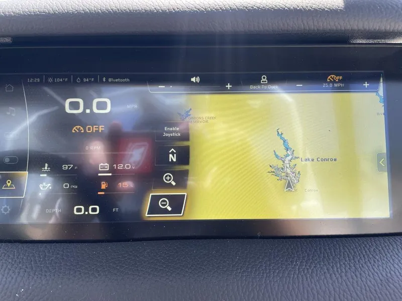 Slide: The Image of 2023 Nautique Super Air Nautique S25 dashboard display showing navigation and boat metrics. - 7