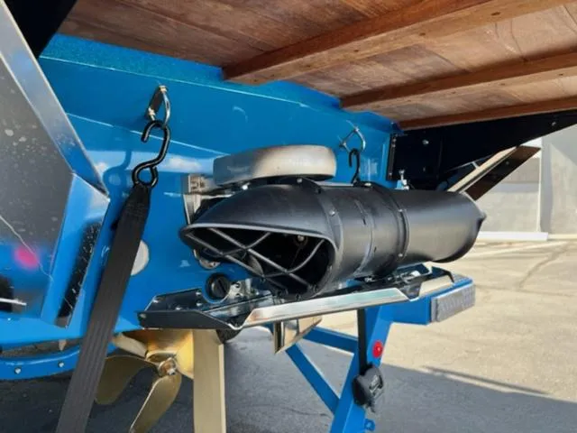 Slide: The Image of 2022 MasterCraft X26 boat underside with propeller and exhaust system. - 9
