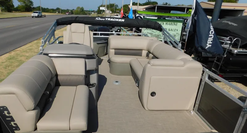 Slide: The Image of 2024 Sun Tracker Fishin' Barge 20 DLX pontoon boat with spacious seating and modern design. - 8
