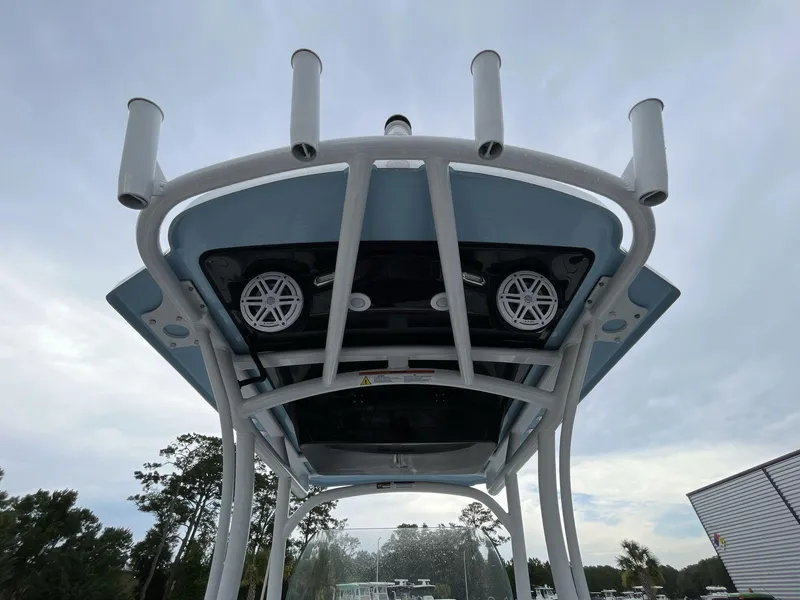 Slide: The Image of 2023 Wellcraft 242 Fisherman T-top with rod holders and speakers. - 10