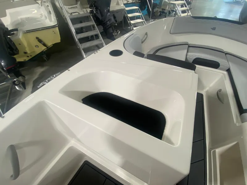 Slide: The Image of 2024 Bayliner Element M19 boat interior with seating and storage compartments. - 17