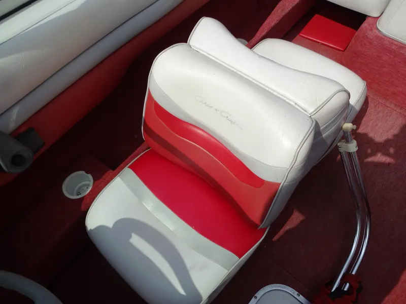 Slide: The Image of 1993 Chris-Craft 197 Concept boat seat with red and white upholstery. - 11