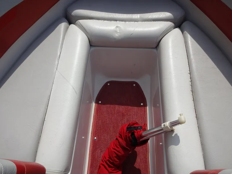 Slide: The Image of Interior of 1993 Chris-Craft 197 Concept boat with white and red seating. - 8