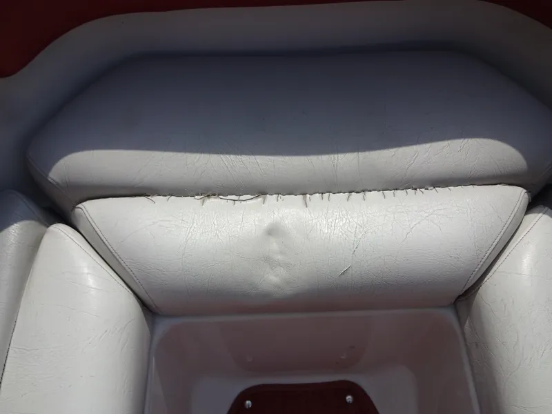 Slide: The Image of Worn seat upholstery of a 1993 Chris-Craft 197 Concept boat. - 9