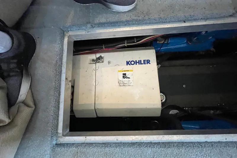 Slide: The Image of Kohler generator in 1996 Carver 400 Cockpit Motor Yacht engine compartment. - 19