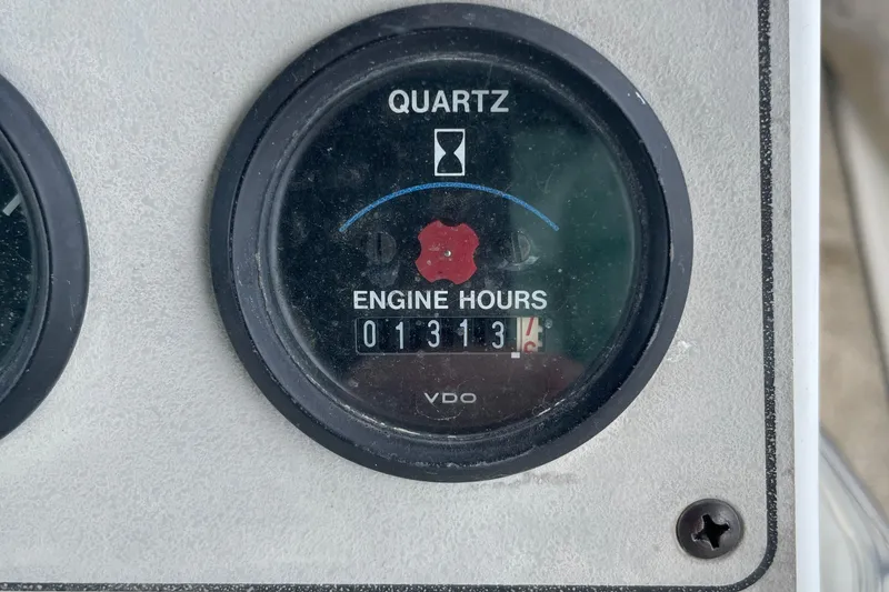 Slide: The Image of Close-up of engine hour meter reading 1313 on 1996 Carver 400 Cockpit Motor Yacht. - 22