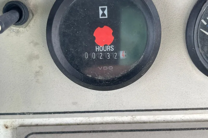 Slide: The Image of Hour meter showing 2324 hours on 1996 Carver 400 Cockpit Motor Yacht. - 23