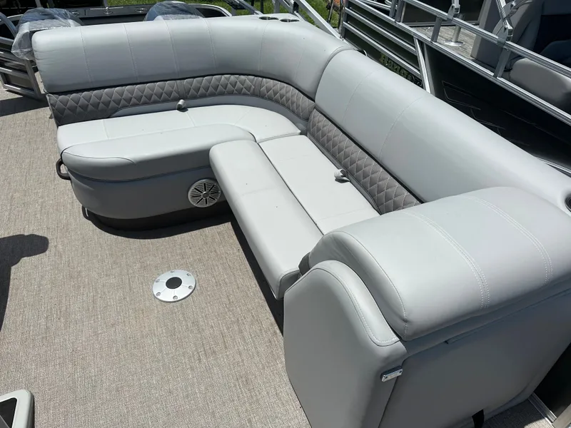 Slide: The Image of 2024 Ranger 220F boat with luxurious gray seating and quilted accents. - 6