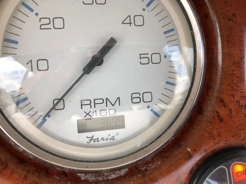 Slide: The Image of Tachometer of 2003 Silverton 35 Motor Yacht showing RPM reading. - 34
