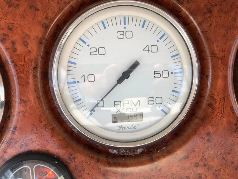 Slide: The Image of Close-up of a 2003 Silverton 35 Motor Yacht RPM gauge, showing 40 RPM x100. - 35