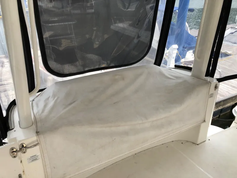 Slide: The Image of 2003 Silverton 35 Motor Yacht covered seating area. - 5