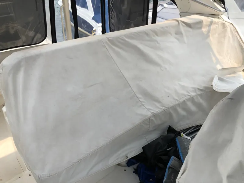 Slide: The Image of Covered seating area on a 2003 Silverton 35 Motor Yacht. - 9