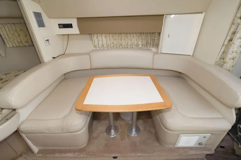 Slide: The Image of 2000 Formula 31 PC interior seating area with table. - 14