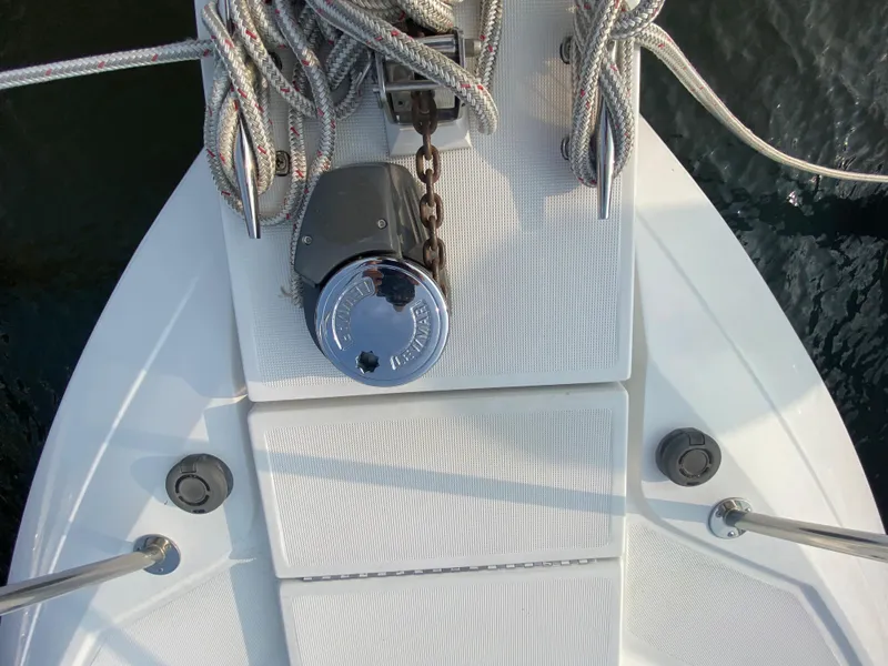 Slide: The Image of Bow of a 2000 Formula 31 PC boat with anchor chain and ropes. - 5