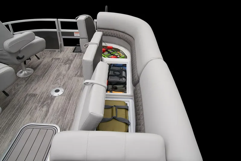 Slide: The Image of 2024 Ranger Reata 223FC pontoon boat with under-seat storage compartments. - 18