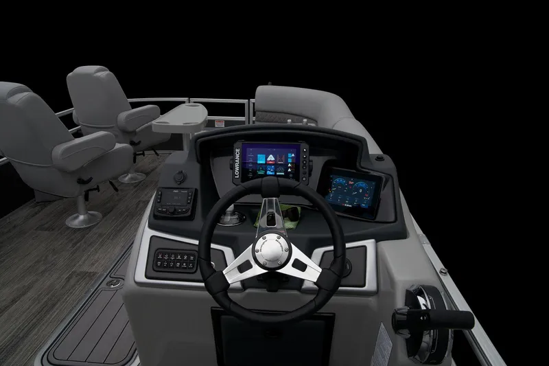 Slide: The Image of 2024 Ranger Reata 223FC boat dashboard with modern controls and navigation screens. - 26