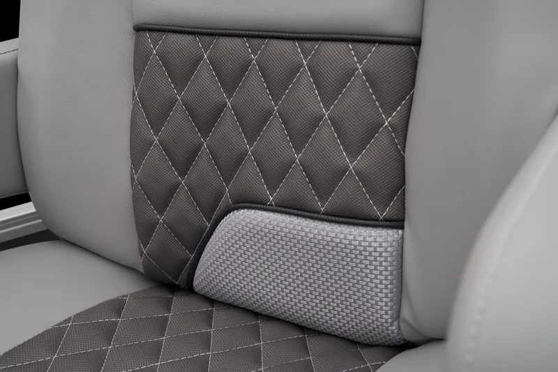 Slide: The Image of 2024 Ranger Reata 223FC seat with diamond-stitched upholstery and textured fabric insert. - 37