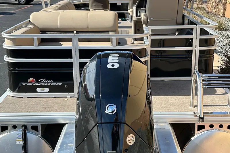 Slide: The Image of 2024 Sun Tracker Sportfish 24 XP3 pontoon boat with 250 HP Mercury engine. - 2