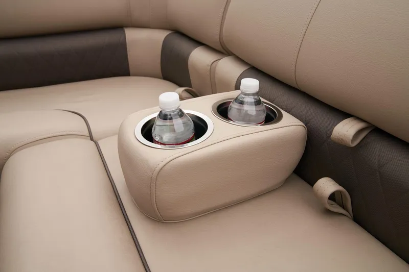 Slide: The Image of 2024 Sun Tracker Sportfish 24 XP3 boat interior with cup holders. - 47