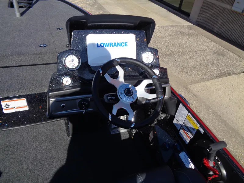 Slide: The Image of 2024 Nitro Z19 Pro boat dashboard with Lowrance electronics and steering wheel. - 9