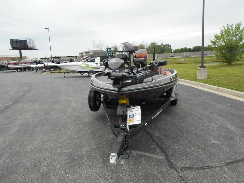 Slide: The Image of 2024 Ranger Z519 Ranger Cup Equipped boat on trailer in parking lot. - 3