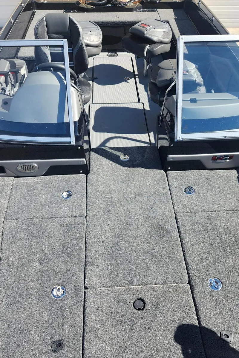 Slide: The Image of 2024 Ranger 621FS Ranger Cup Equipped boat interior with seating and windshield. - 10