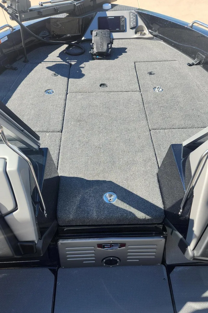 Slide: The Image of 2024 Ranger 621FS Ranger Cup Equipped boat interior with advanced fishing equipment. - 11