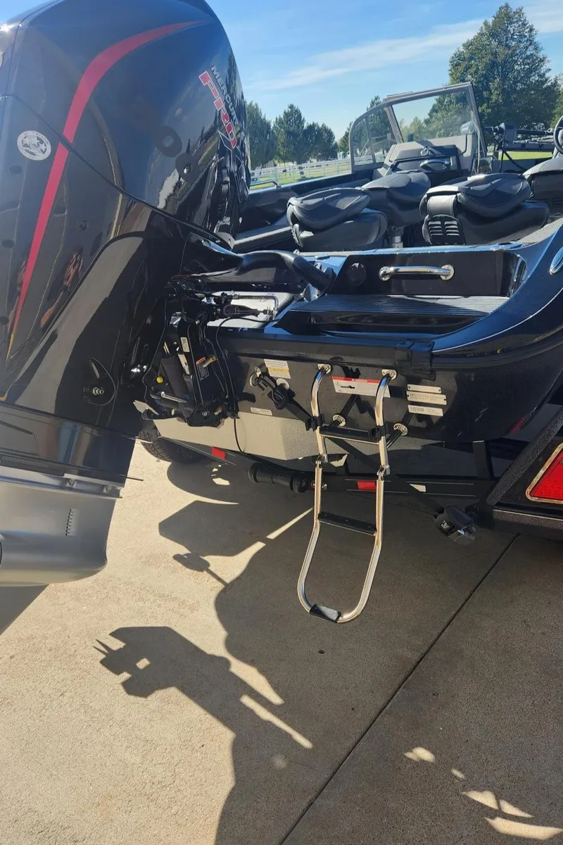 Slide: The Image of 2024 Ranger 621FS Ranger Cup Equipped boat with outboard motor and ladder. - 6