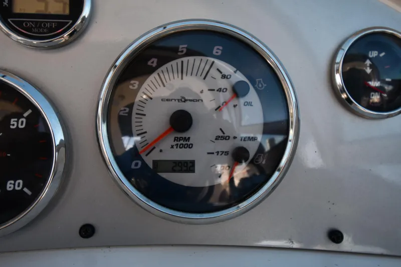 Slide: The Image of 2006 Monterey 298SC Super Sport boat interior with steering wheel and dashboard. - 15