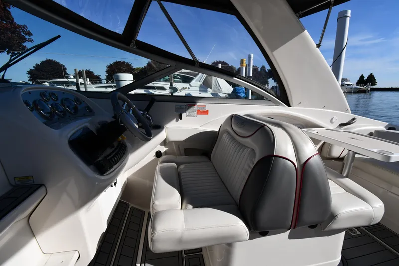 Slide: The Image of Control panel of a 2006 Monterey 298SC Super Sport with Garmin GPS and Fusion audio system. - 17