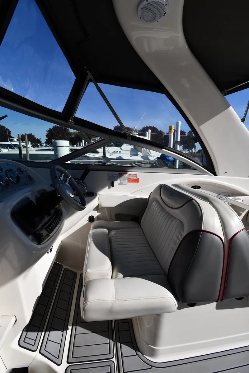 Slide: The Image of Dashboard gauges of a 2006 Monterey 298SC Super Sport boat. - 18