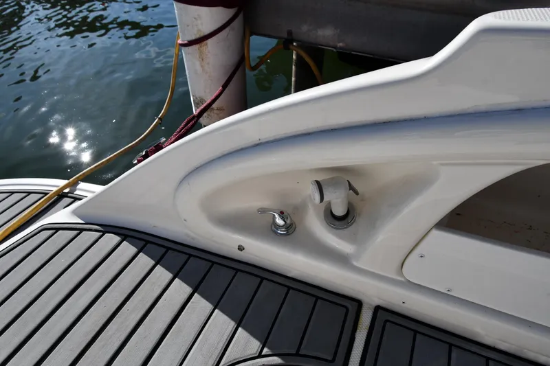 Slide: The Image of Interior of 2006 Monterey 298SC Super Sport boat with seating and table. - 28