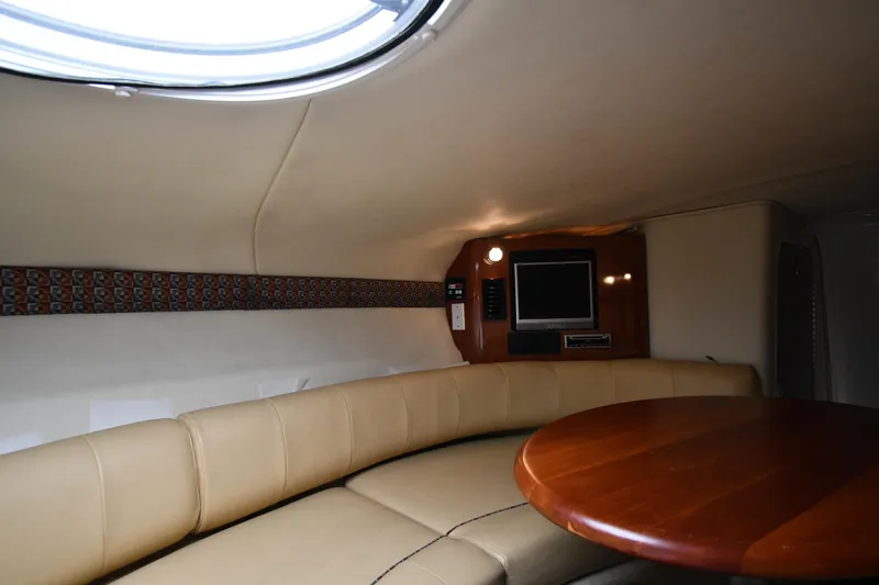 Slide: The Image of 2006 Monterey 298SC Super Sport boat interior with Garmin navigation system and cabin entrance. - 38
