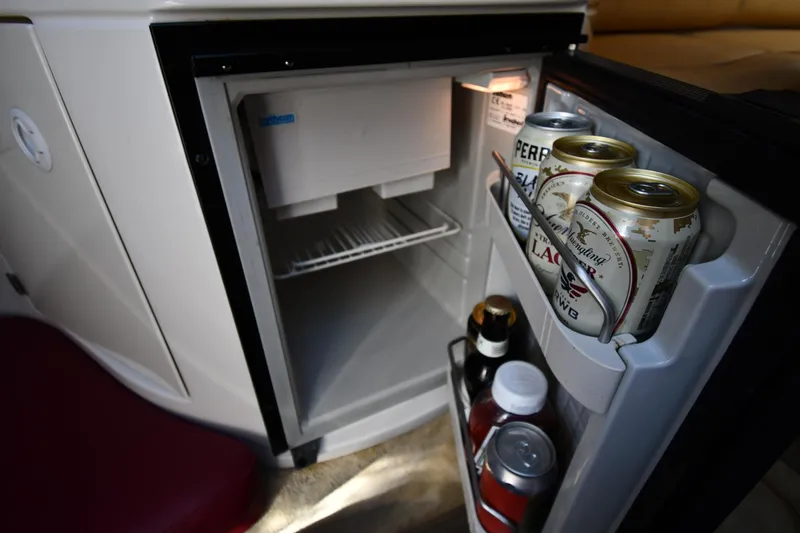 Slide: The Image of Interior of 2006 Monterey 298SC Super Sport with leather seating and round table. - 43