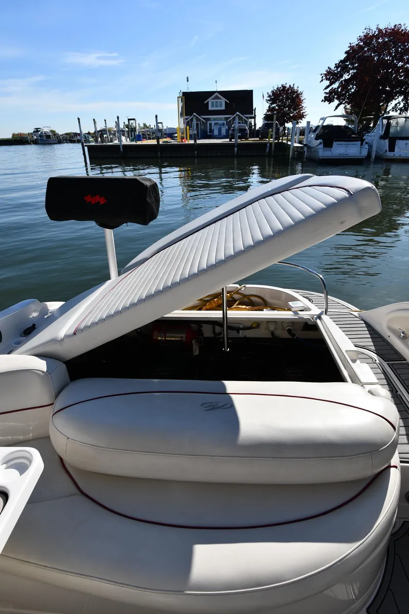 Slide: The Image of Mini fridge inside 2006 Monterey 298SC Super Sport boat, stocked with beverages. - 51