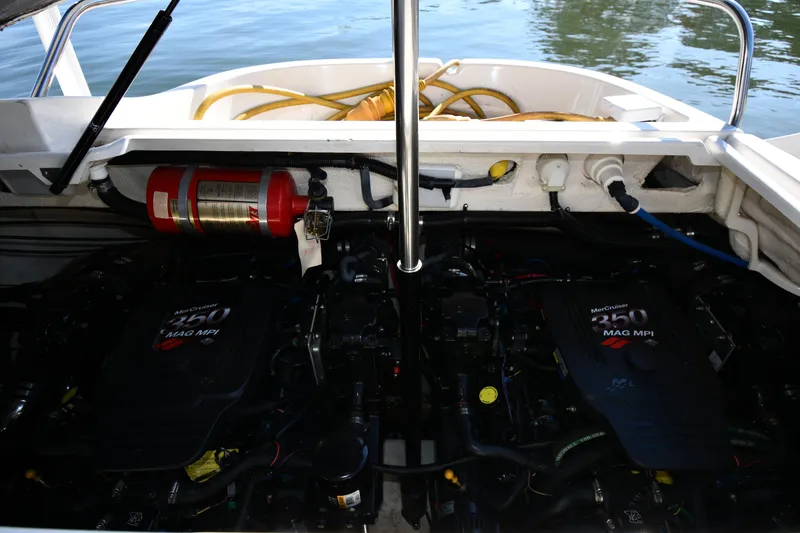 Slide: The Image of Control panel on 2006 Monterey 298SC Super Sport boat, featuring switches and gauges. - 52