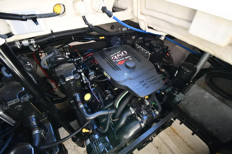 Slide: The Image of Compact bathroom in 2006 Monterey 298SC Super Sport boat with sink and toilet. - 55