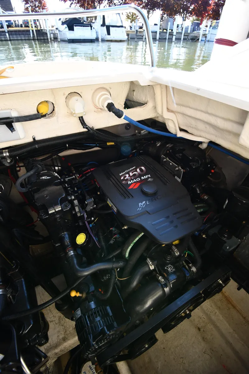 Slide: The Image of Interior cabin of 2006 Monterey 298SC Super Sport with seating and control panel. - 56