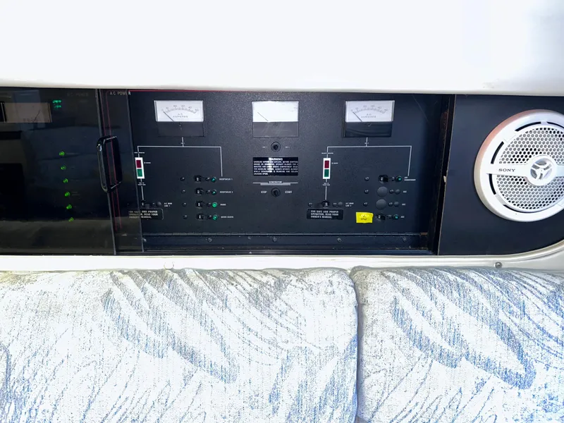 Slide: The Image of Control panel of a 1994 Carver 340 Santego boat with speaker and gauges. - 25