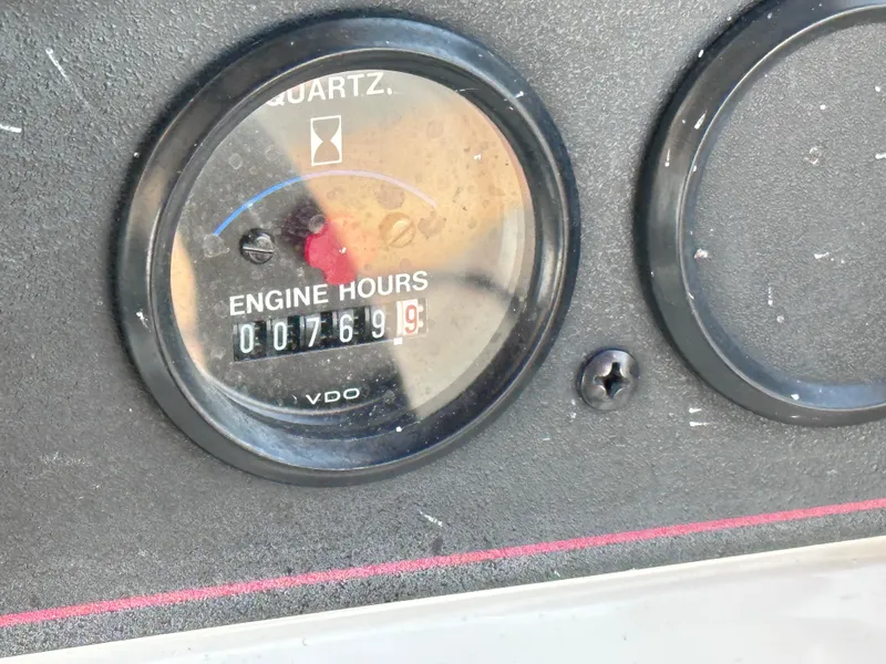 Slide: The Image of 1994 Carver 340 Santego engine hour meter showing 769.9 hours. - 7